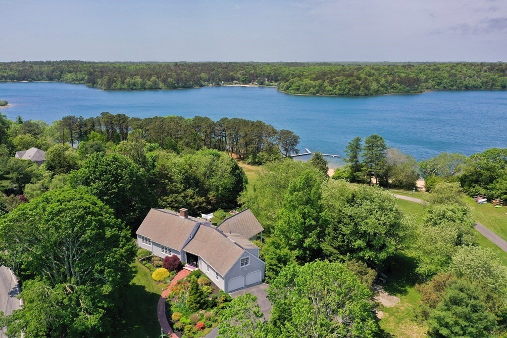 75 Great Hill Road Sandwich, MA 02563 - Photo 1 of 42 an aerial view of a house with outdoor space and lake view