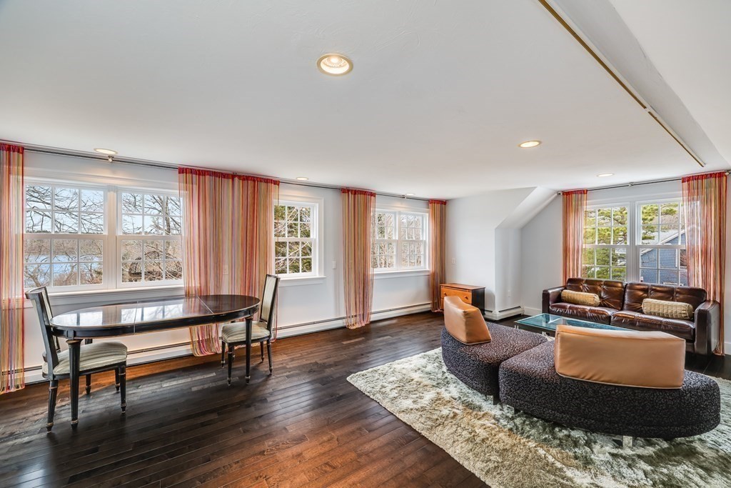 75 Great Hill Road Sandwich, MA 02563 - Photo 33 of 42 a living room with furniture and a wooden floor