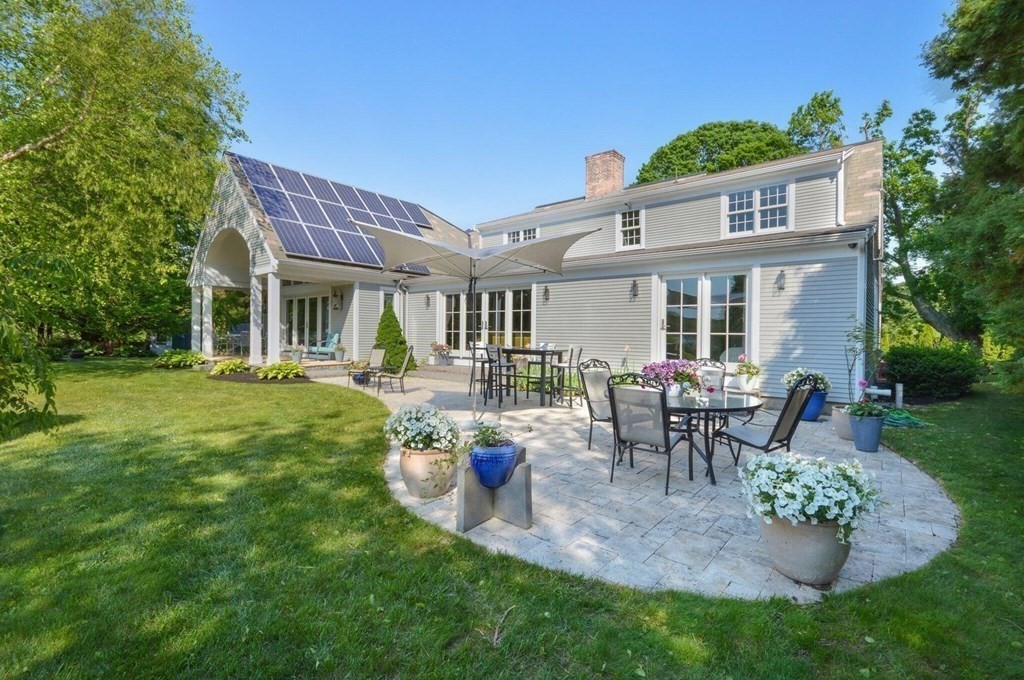75 Great Hill Road Sandwich, MA 02563 - Photo 34 of 42 a view of a house with backyard porch and patio