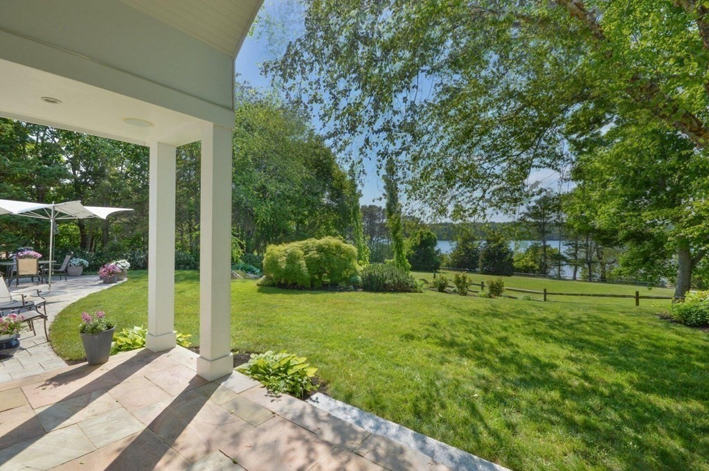 75 Great Hill Road Sandwich, MA 02563 - Photo 37 of 42 a view of a backyard with pathway