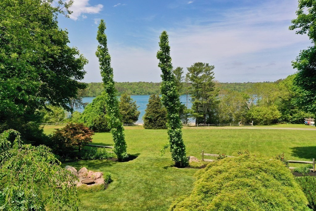 75 Great Hill Road Sandwich, MA 02563 - Photo 39 of 42 a view of a big yard with a large tree