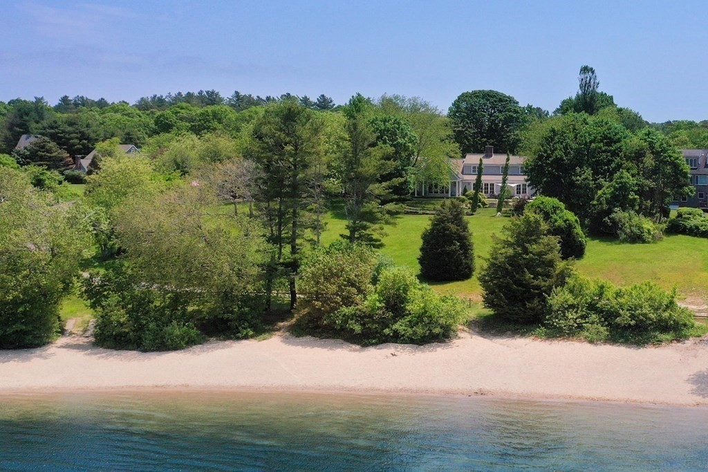 75 Great Hill Road Sandwich, MA 02563 - Photo 41 of 42 a view of a garden with a building in the background