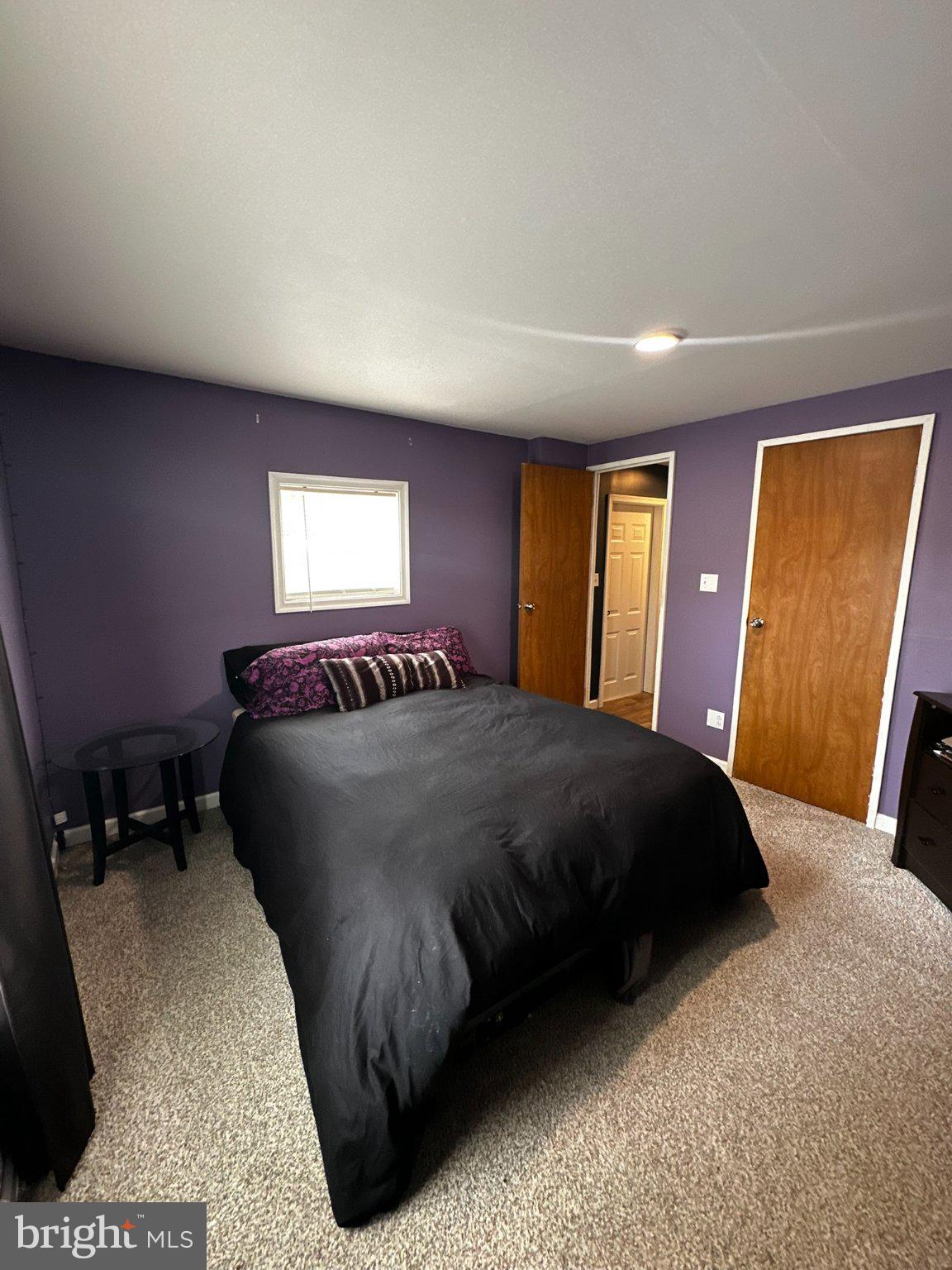 31777 Siham Road Lewes, DE 19958 - Photo 14 of 46 Cozy retreat with vibrant purple walls.