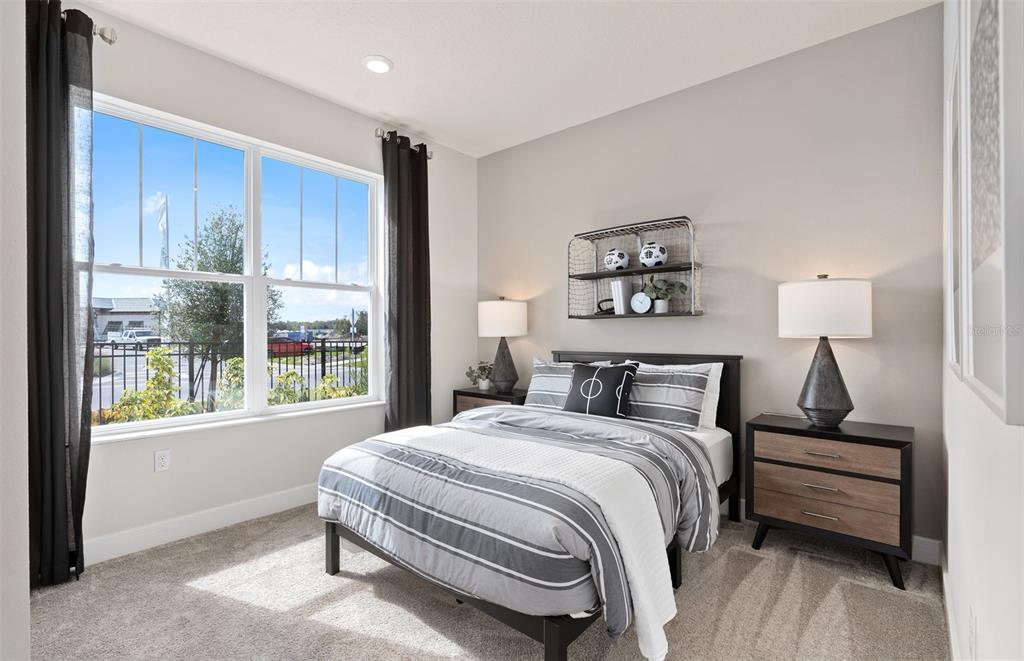 1838 Groveline Road St. Cloud, FL 34771 - Photo 4 of 25 Model Home Design Only. Pictures and furnishings are for illustrative purposes only. Elevations, colors and options may vary. Furniture is for model home staging only.