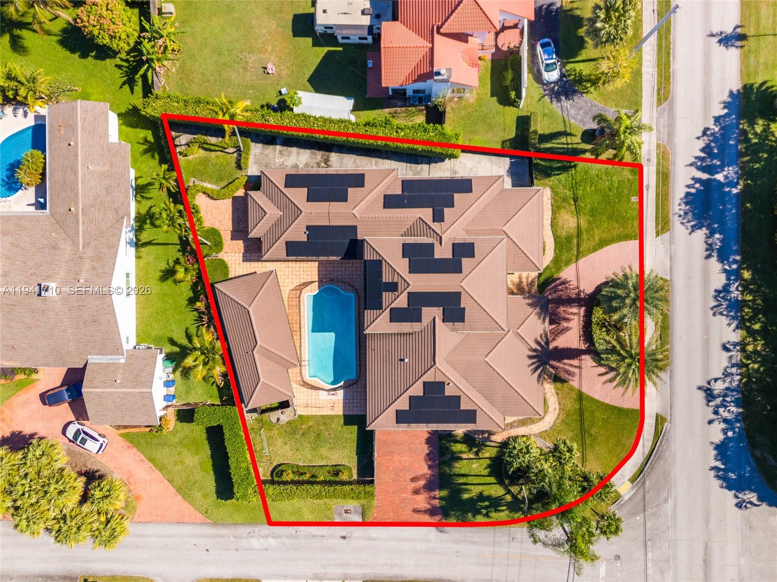 9461 Southwest 128th Street Miami, FL 33176 - Photo 3 of 24 an aerial view of a houses with yard
