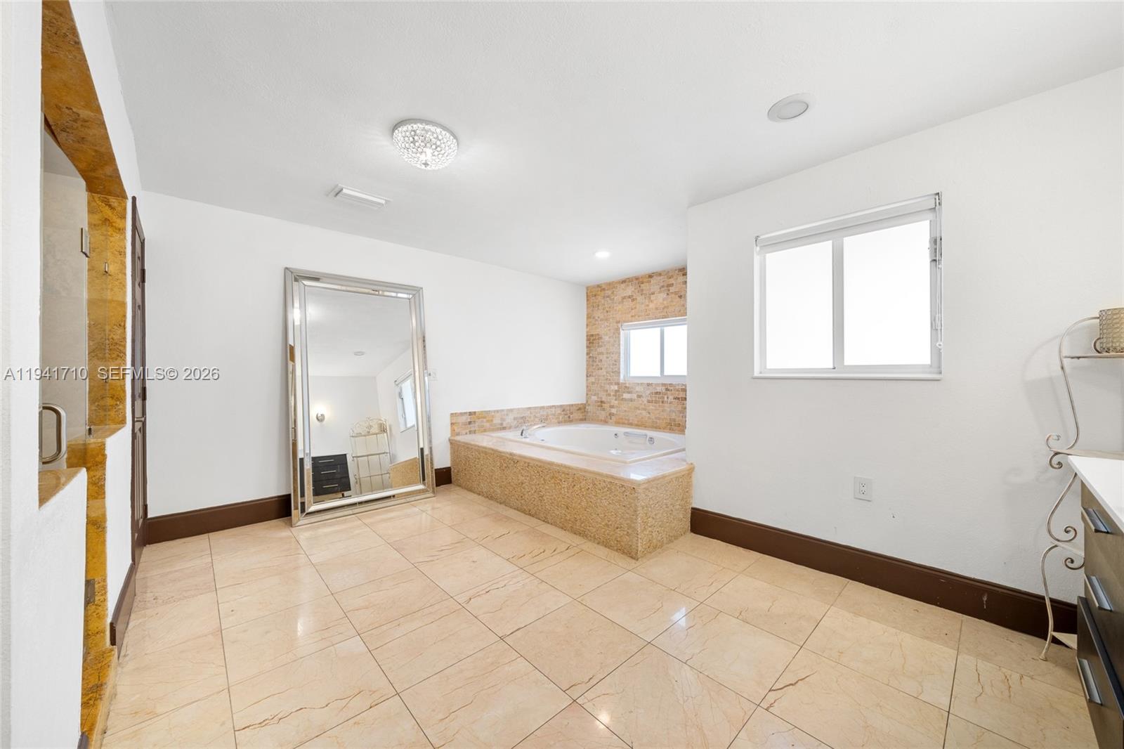 9461 Southwest 128th Street Miami, FL 33176 - Photo 10 of 24 a view of an empty room and window