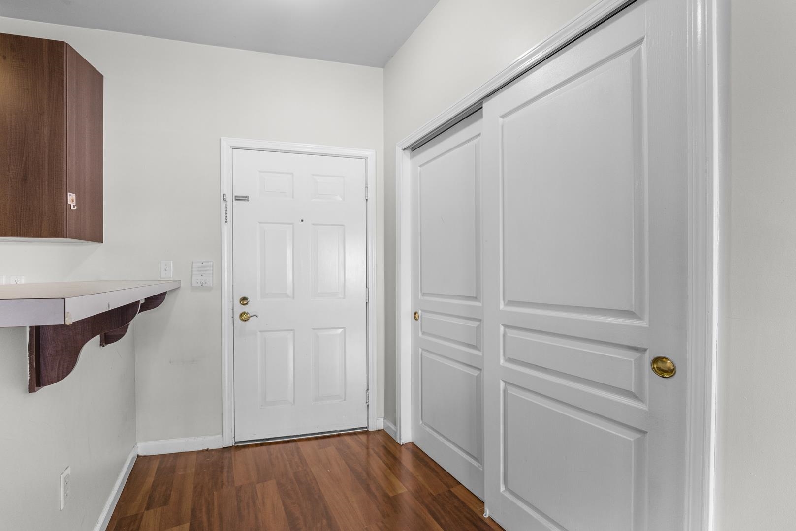 845 Newark Avenue, Unit 3B Jersey City, NJ 07306 - Photo 10 of 26 a view of a hallway with wooden floor