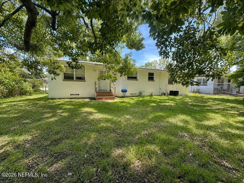 4512 Ish Brant Road West Jacksonville, FL 32210 - Photo 41 of 45 Updated Backyard