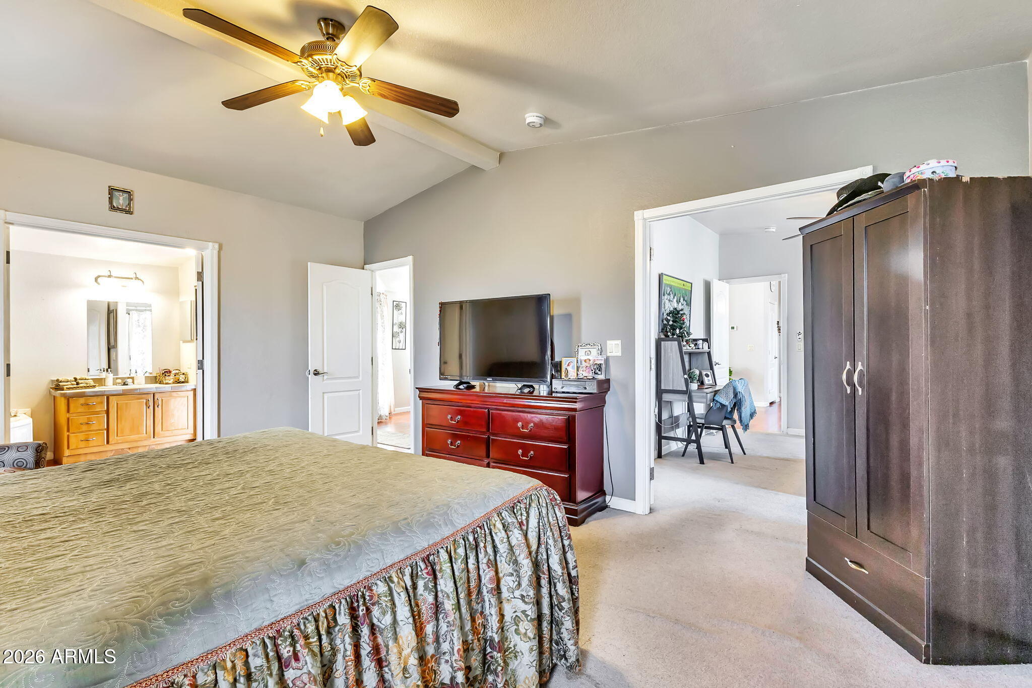 1236 West Judd Road San Tan Valley, AZ 85144 - Photo 13 of 28 a bedroom with a bed and a chandelier