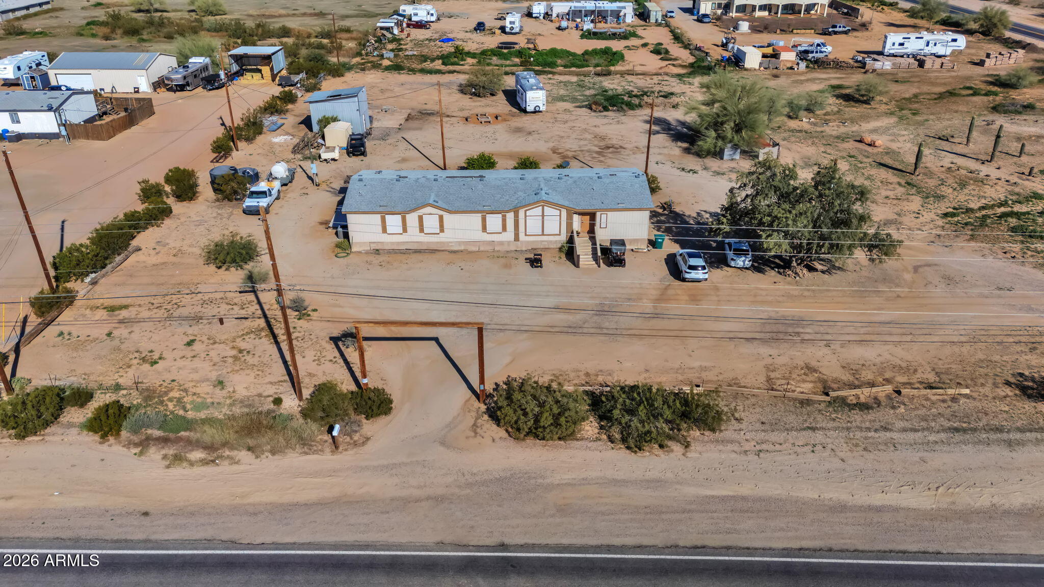 1236 West Judd Road San Tan Valley, AZ 85144 - Photo 27 of 28 an aerial view of a house with a yard and sitting space