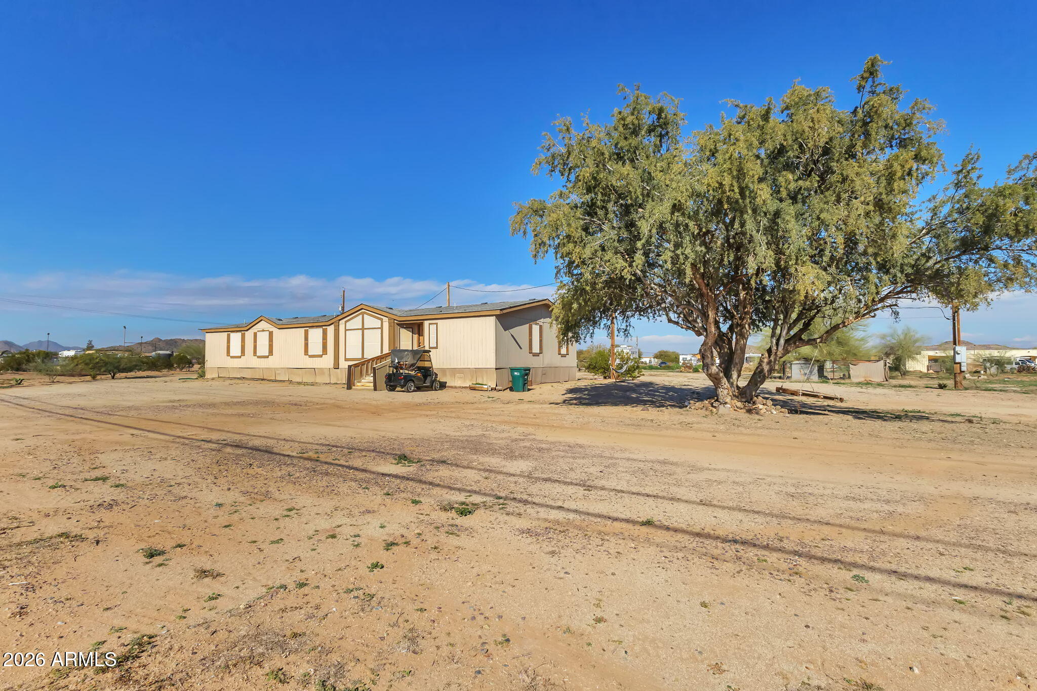 1236 West Judd Road San Tan Valley, AZ 85144 - Photo 4 of 28 a view of road and with trees