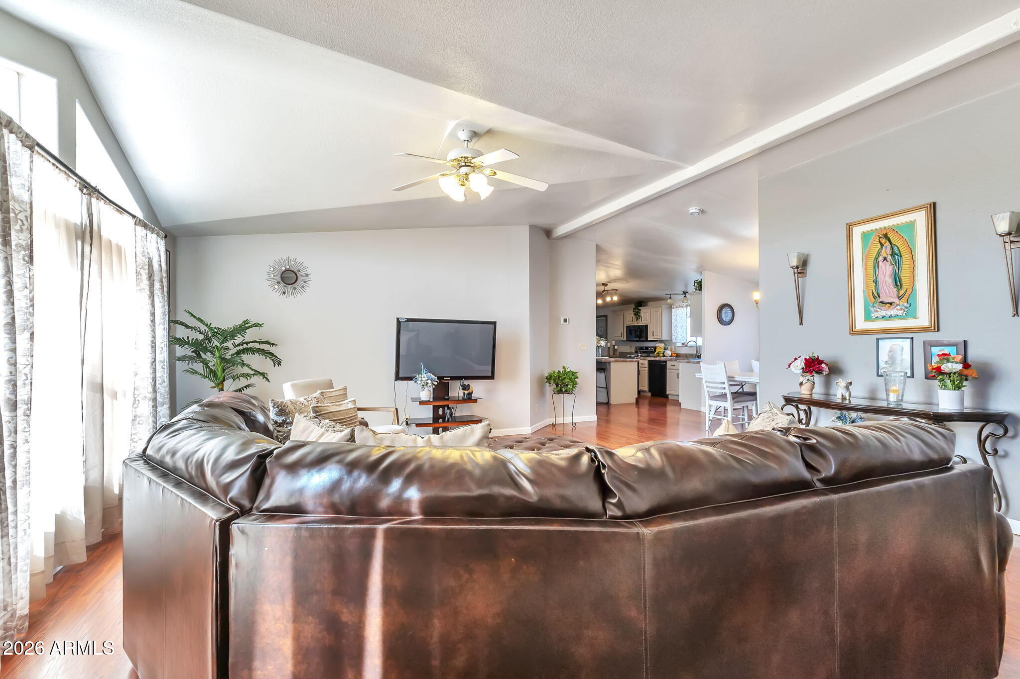 1236 West Judd Road San Tan Valley, AZ 85144 - Photo 5 of 28 a room with furniture and a flat screen tv