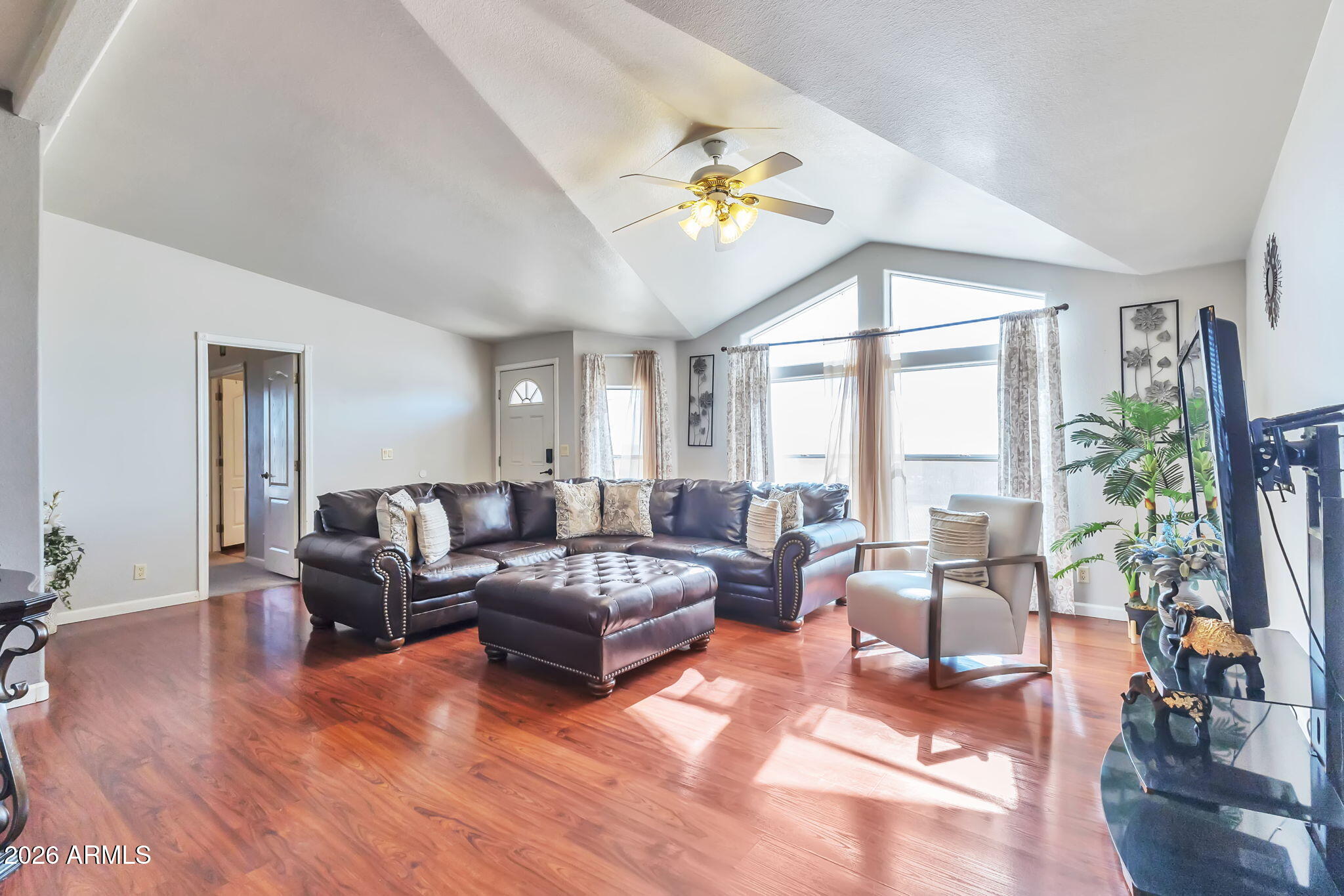 1236 West Judd Road San Tan Valley, AZ 85144 - Photo 6 of 28 a living room with furniture and a large window