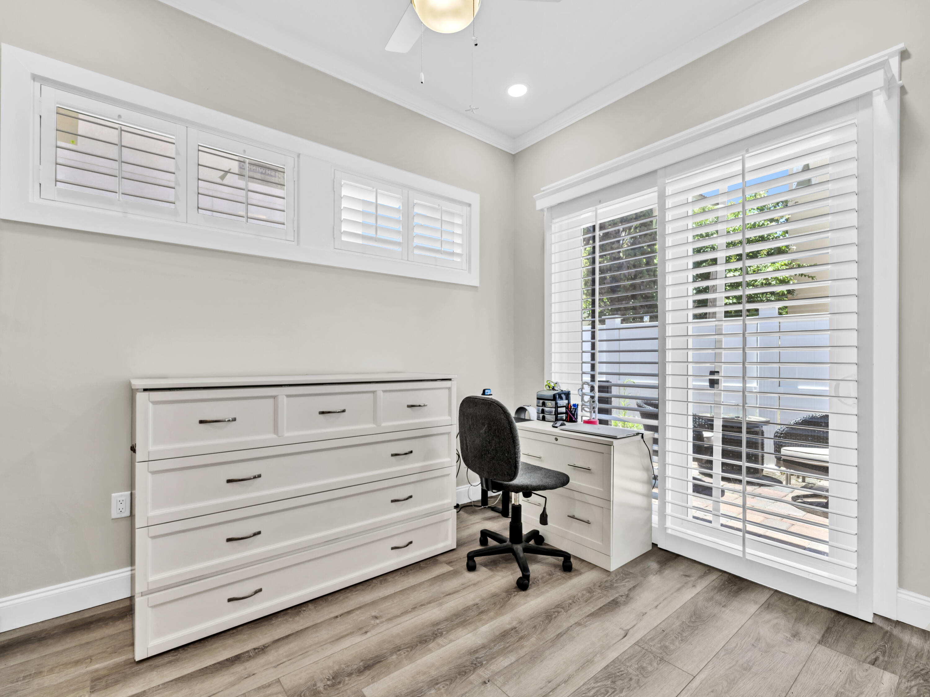 4707 Amhurst Circle Destin, FL 32541 - Photo 19 of 40 a view of a workspace with furniture and a window