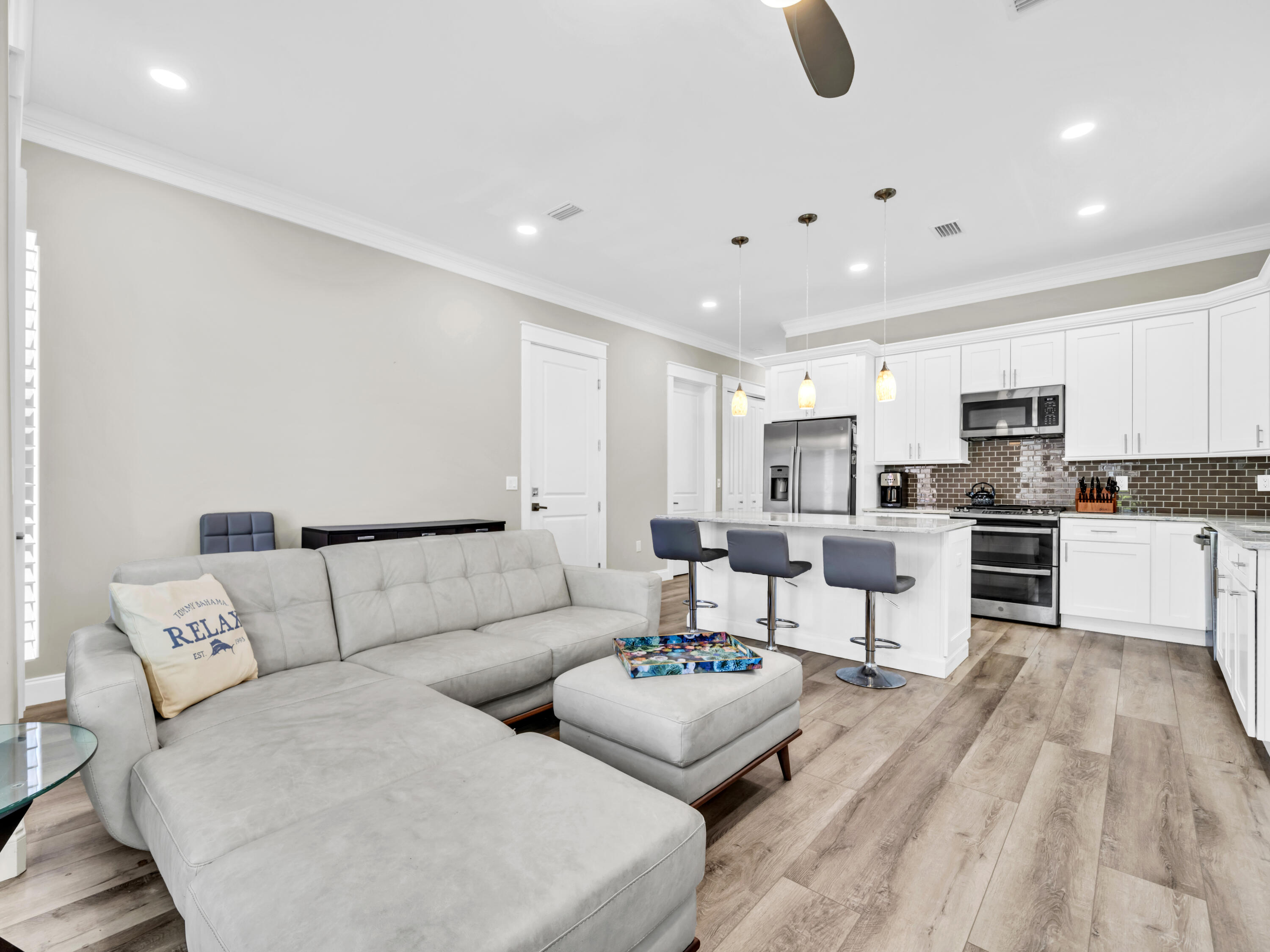 4707 Amhurst Circle Destin, FL 32541 - Photo 2 of 40 a living room with furniture and kitchen view