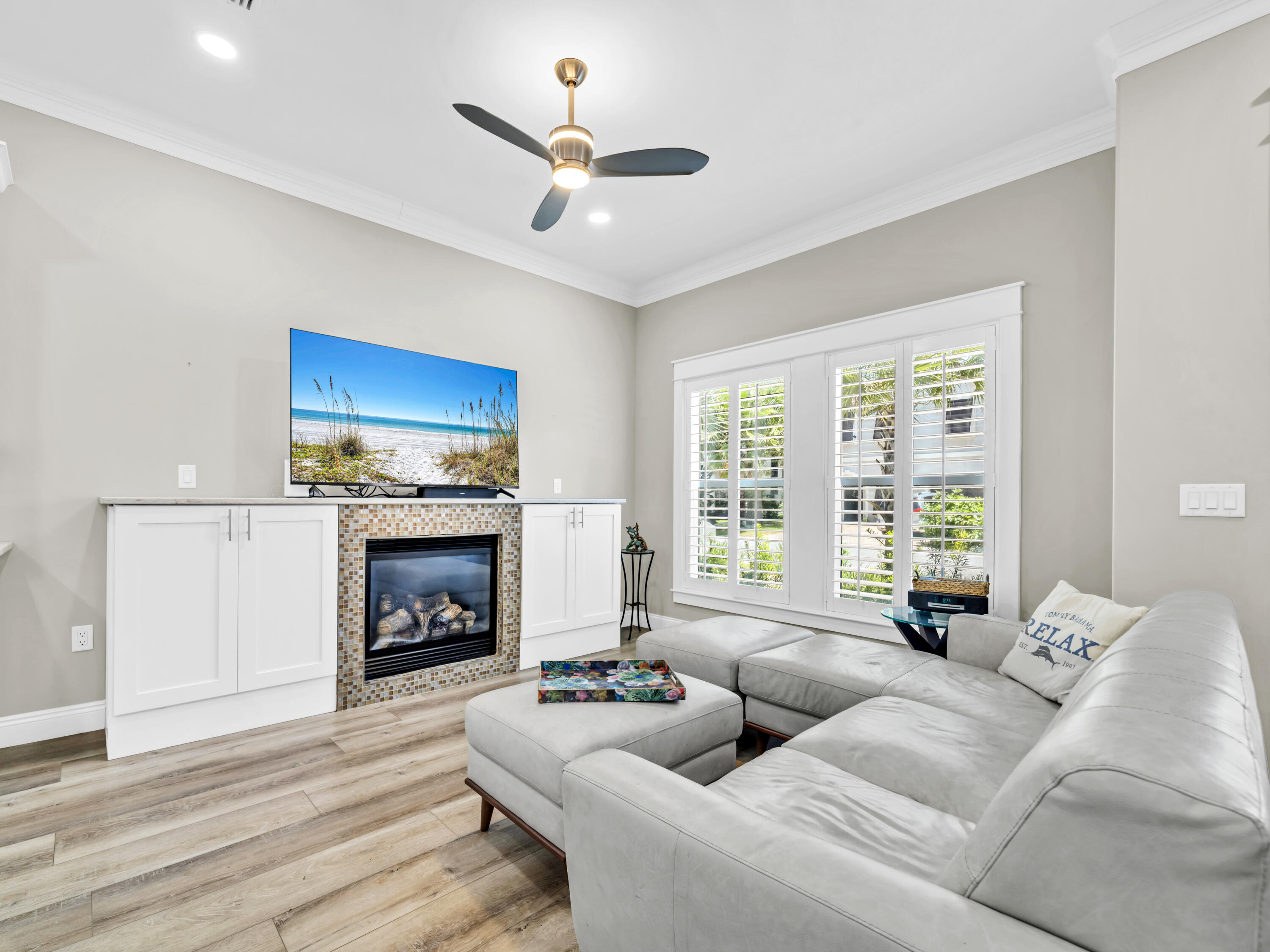 4707 Amhurst Circle Destin, FL 32541 - Photo 7 of 40 a living room with furniture and a fireplace