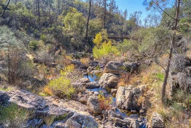 a aerial view of a house with a yard