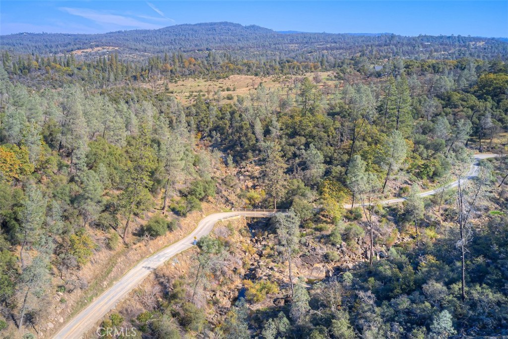 0 Swedes Flat Road Oroville, CA 95966 - Photo 14 of 28 a view of a forest with trees and mountain view