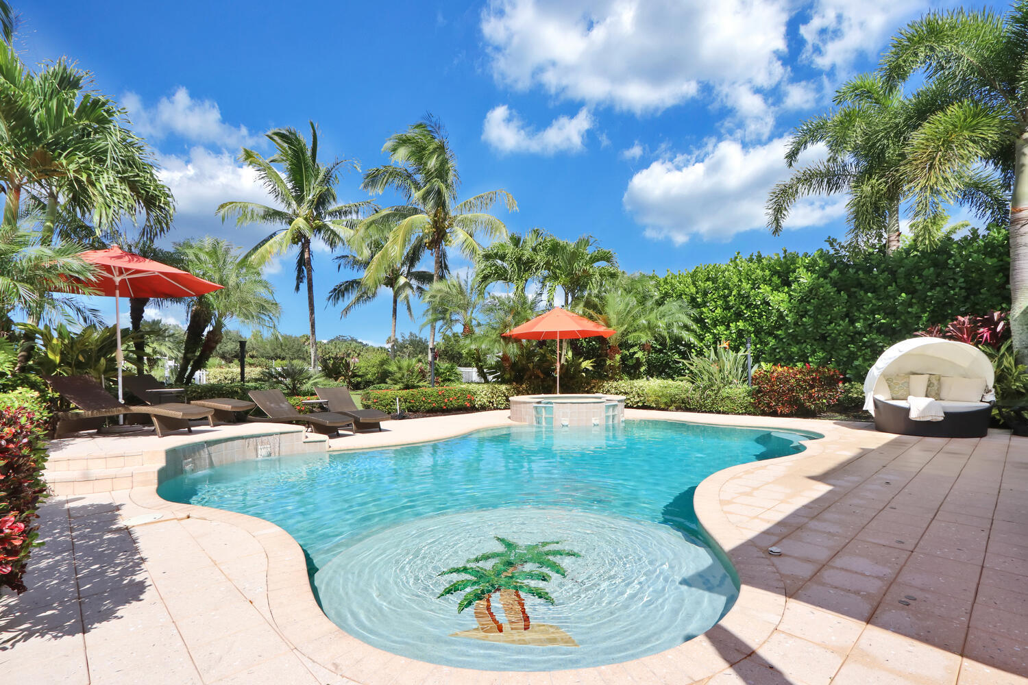 a view of a swimming pool with a patio