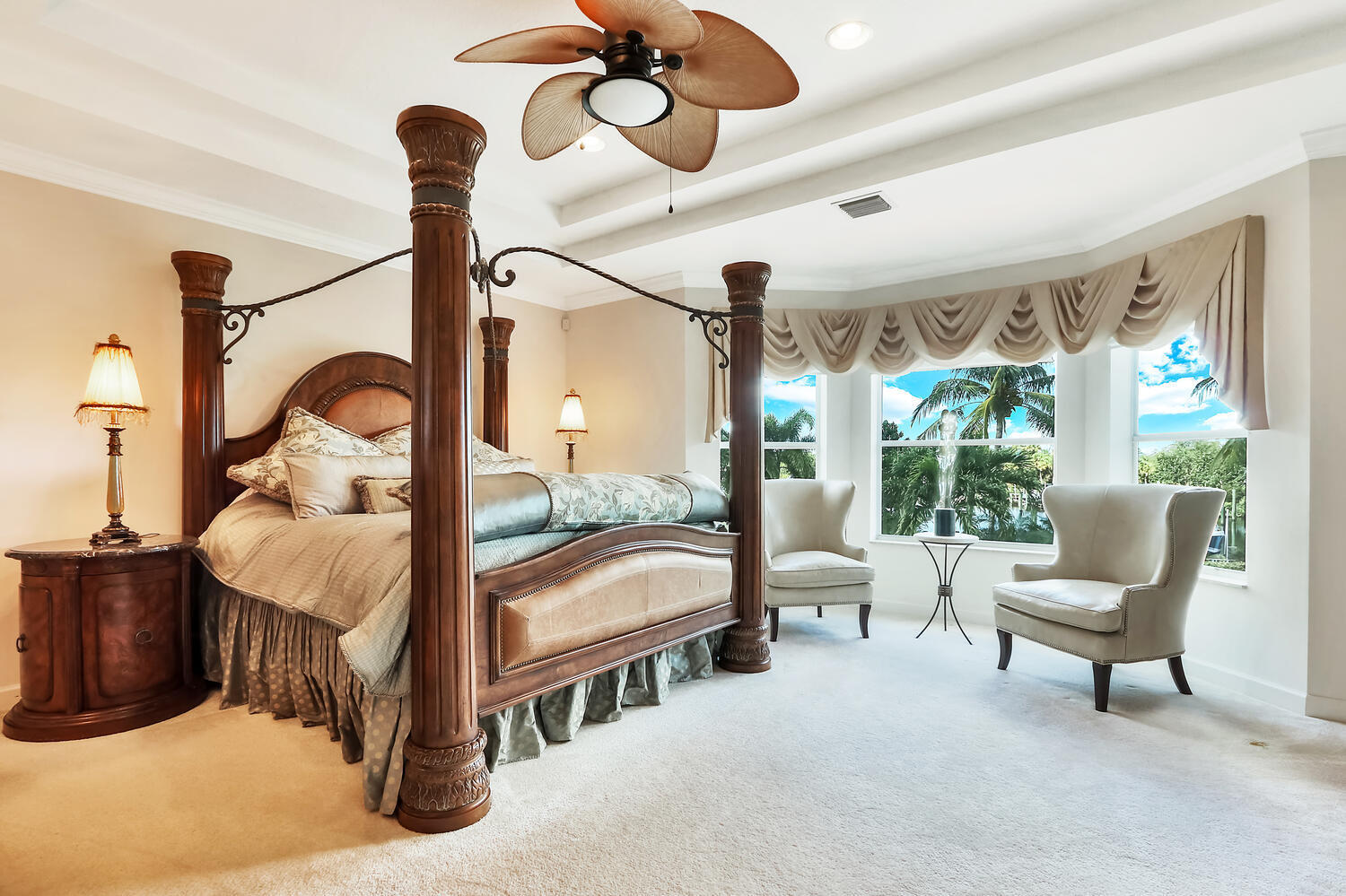 585 Southwest Yacht Basin Way Stuart, FL 34997 - Photo 13 of 31 a bedroom with furniture and a chandelier
