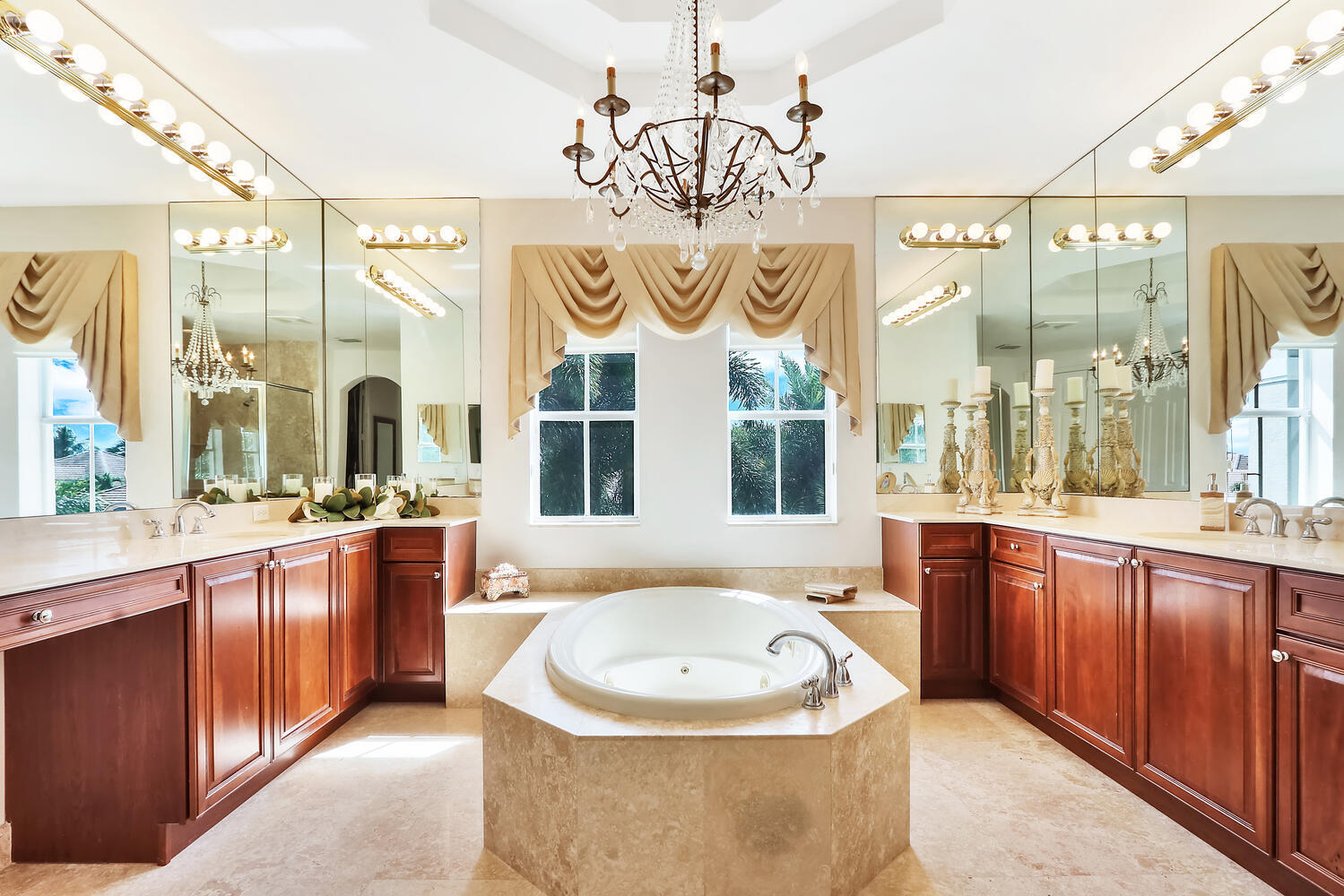 585 Southwest Yacht Basin Way Stuart, FL 34997 - Photo 14 of 31 a spacious bathroom with a tub sink and mirror