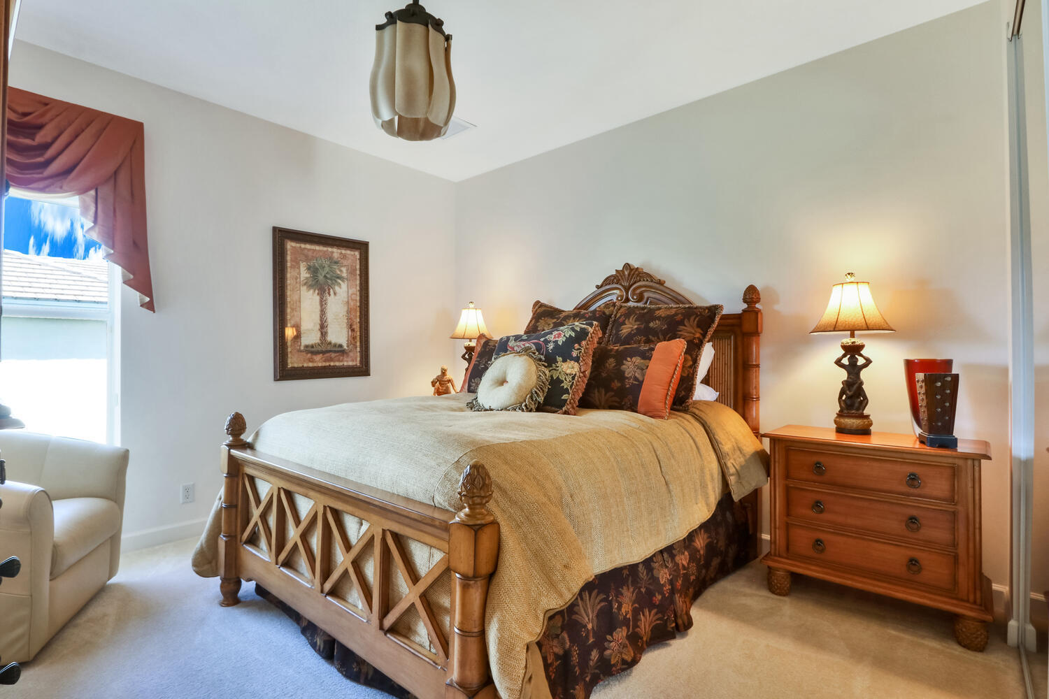 585 Southwest Yacht Basin Way Stuart, FL 34997 - Photo 17 of 31 a bedroom with bed and window