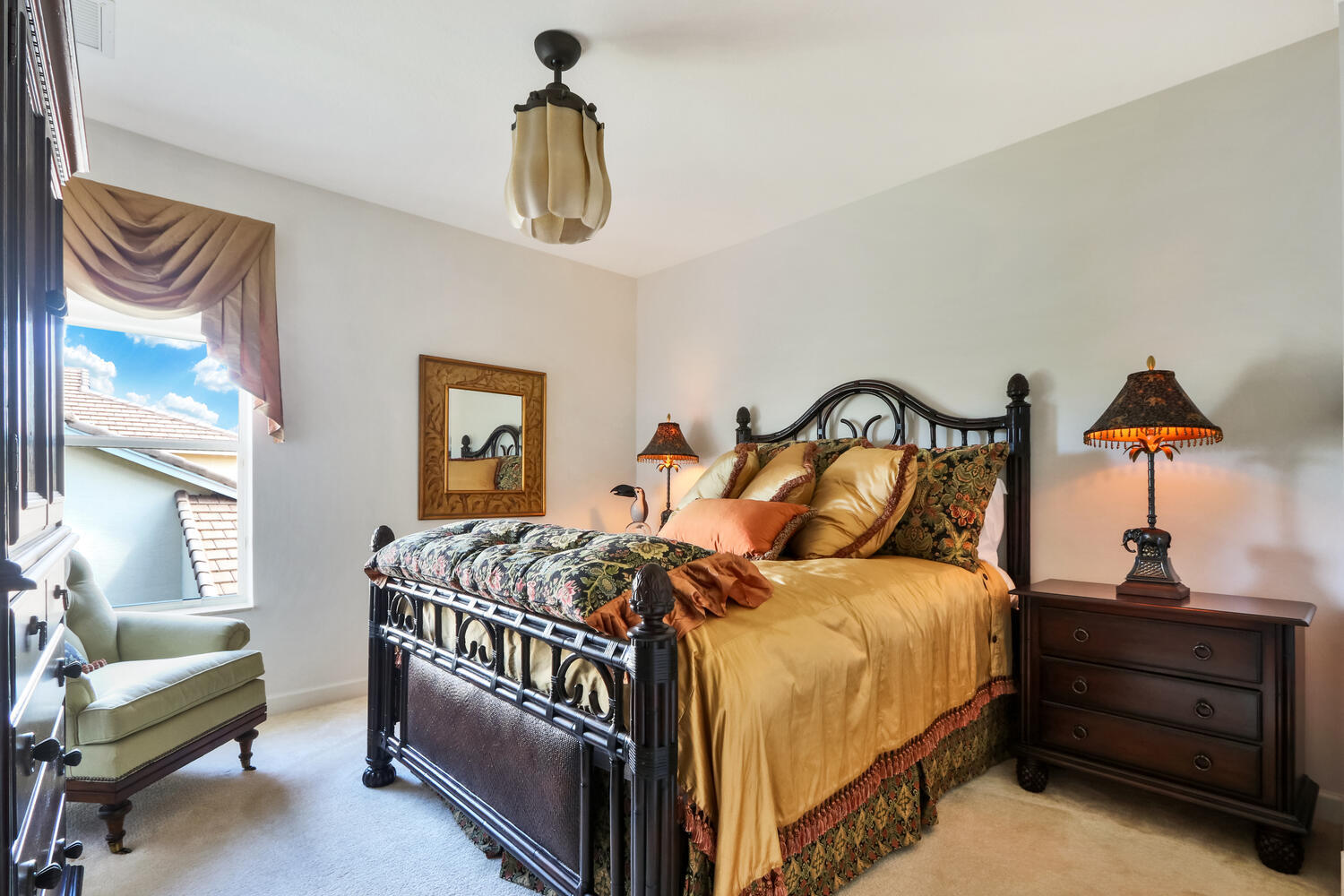 585 Southwest Yacht Basin Way Stuart, FL 34997 - Photo 18 of 31 a bedroom with a bed and a painting on the wall