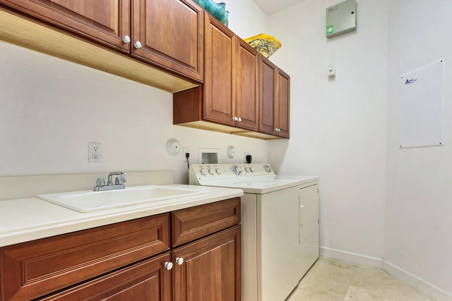 585 Southwest Yacht Basin Way Stuart, FL 34997 - Photo 21 of 31 a bathroom with a sink and a mirror