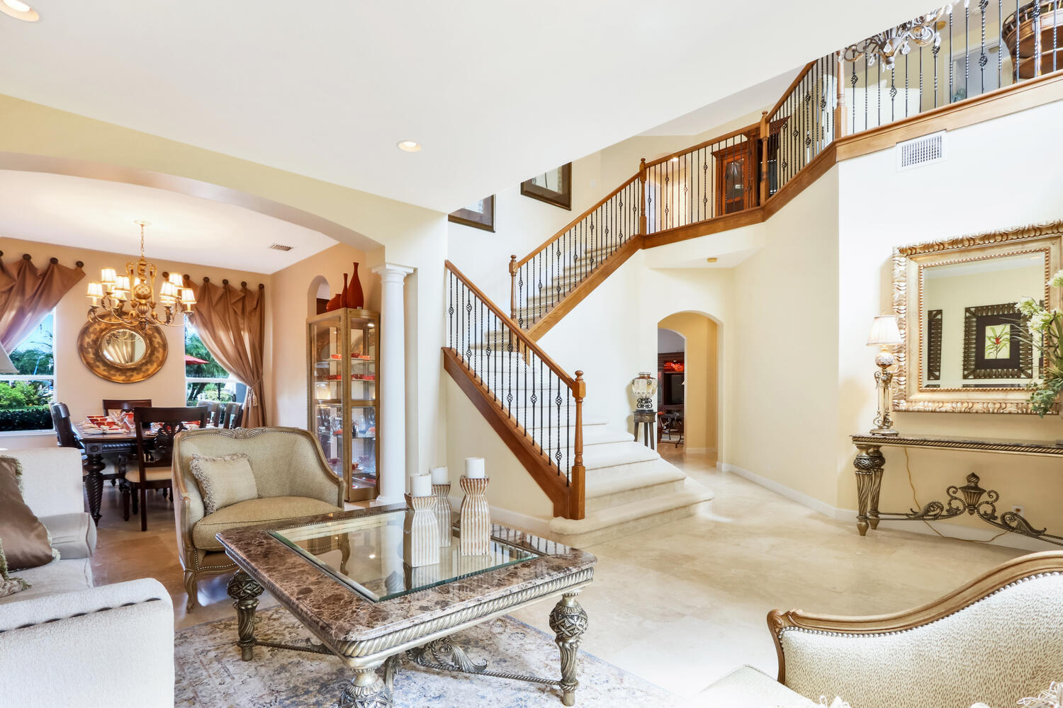 585 Southwest Yacht Basin Way Stuart, FL 34997 - Photo 22 of 31 a living room with furniture and a clock