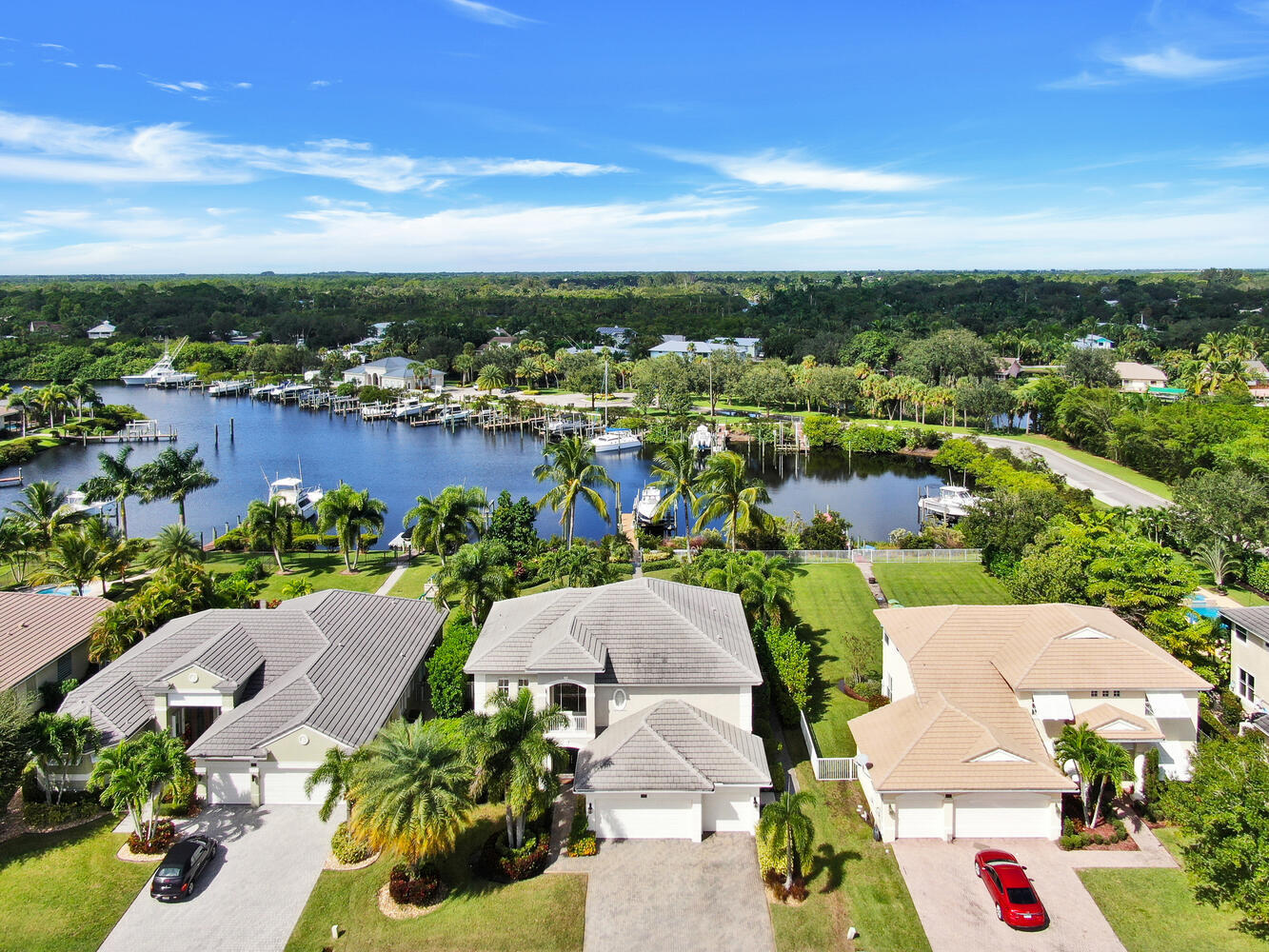 585 Southwest Yacht Basin Way Stuart, FL 34997 - Photo 3 of 31 an aerial view of residential houses with outdoor space