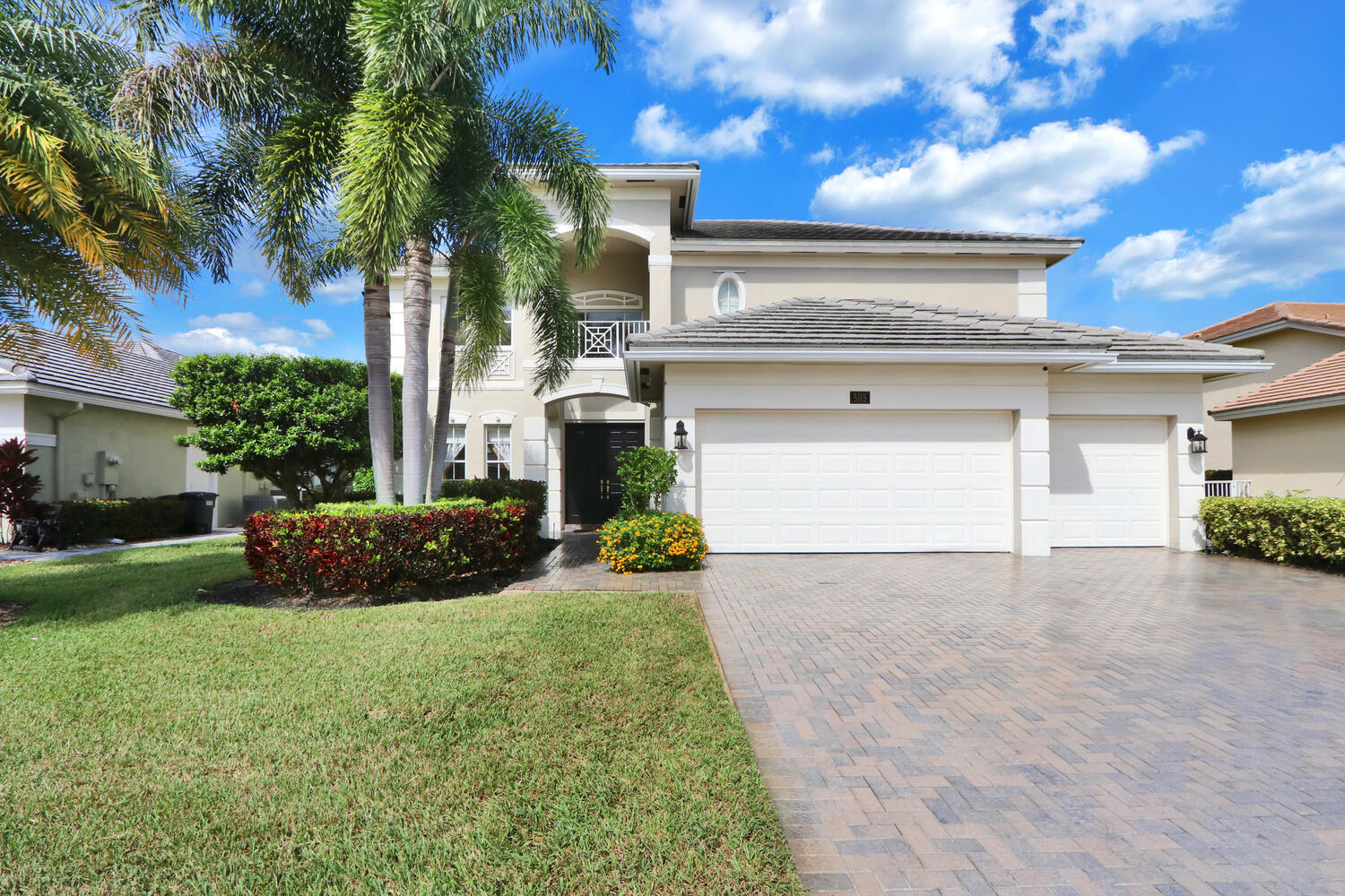 585 Southwest Yacht Basin Way Stuart, FL 34997 - Photo 6 of 31 a view of a house with a yard and potted plants