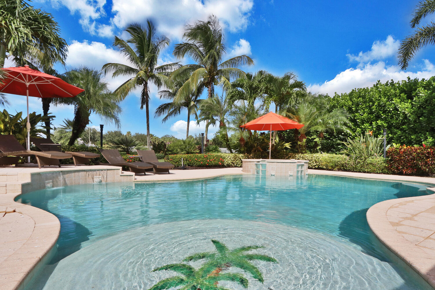 585 Southwest Yacht Basin Way Stuart, FL 34997 - Photo 8 of 31 a view of a swimming pool with a garden
