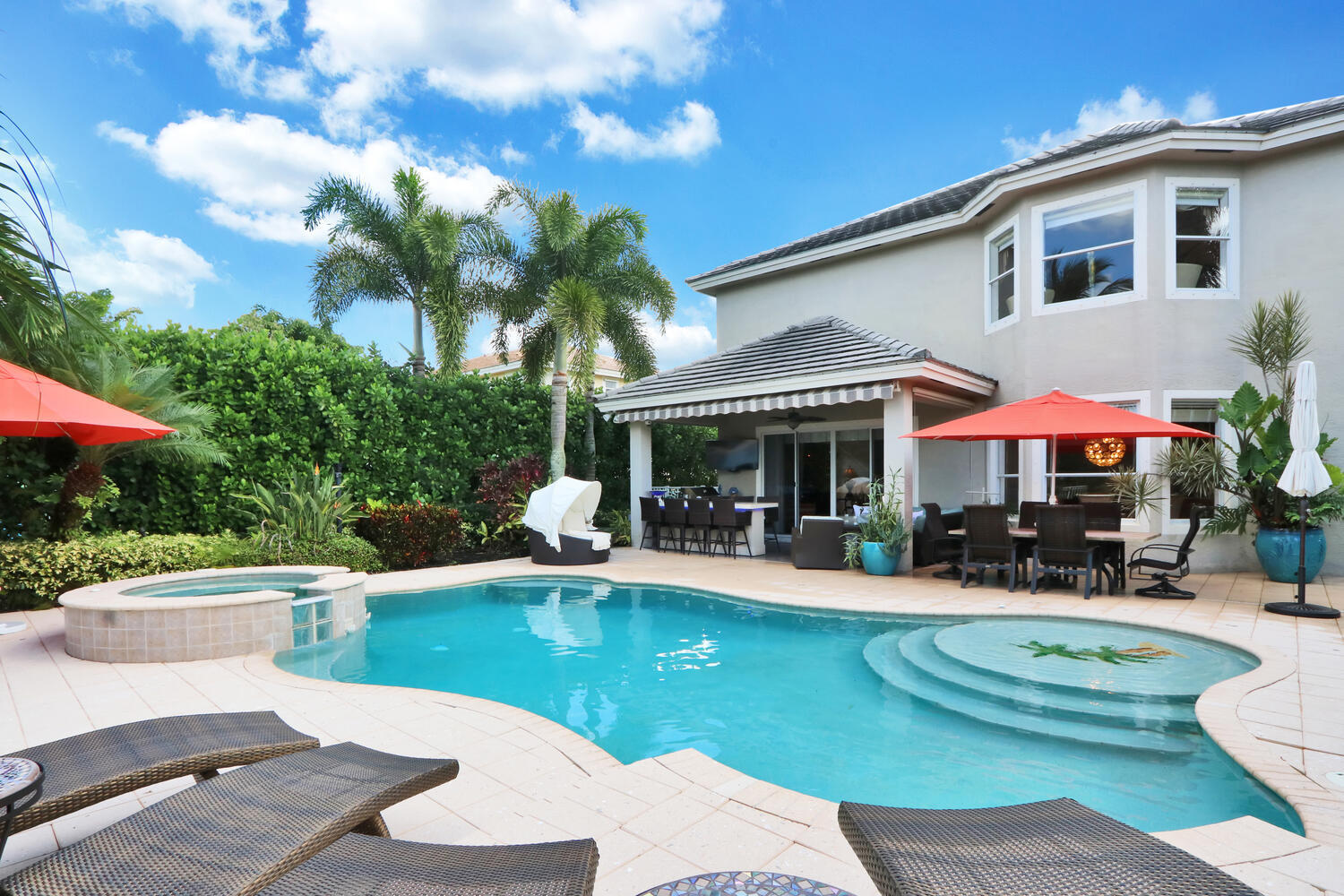 585 Southwest Yacht Basin Way Stuart, FL 34997 - Photo 9 of 31 a view of a house with swimming pool and sitting area