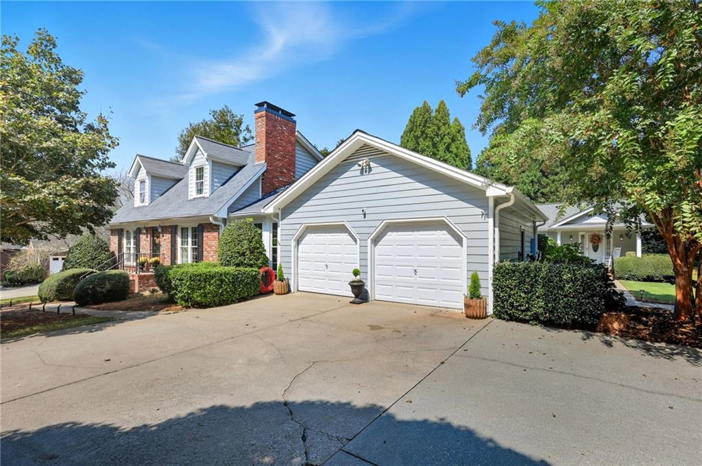 153 Dunlap Landing Road Gainesville, GA 30506 - Photo 3 of 67 a front view of a house with a yard and potted plants