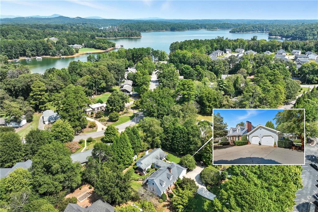 153 Dunlap Landing Road Gainesville, GA 30506 - Photo 36 of 67 an aerial view of a house with a yard and lake view