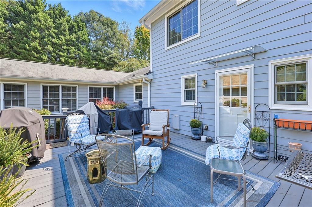 153 Dunlap Landing Road Gainesville, GA 30506 - Photo 38 of 67 a view of a house with a patio and a chairs