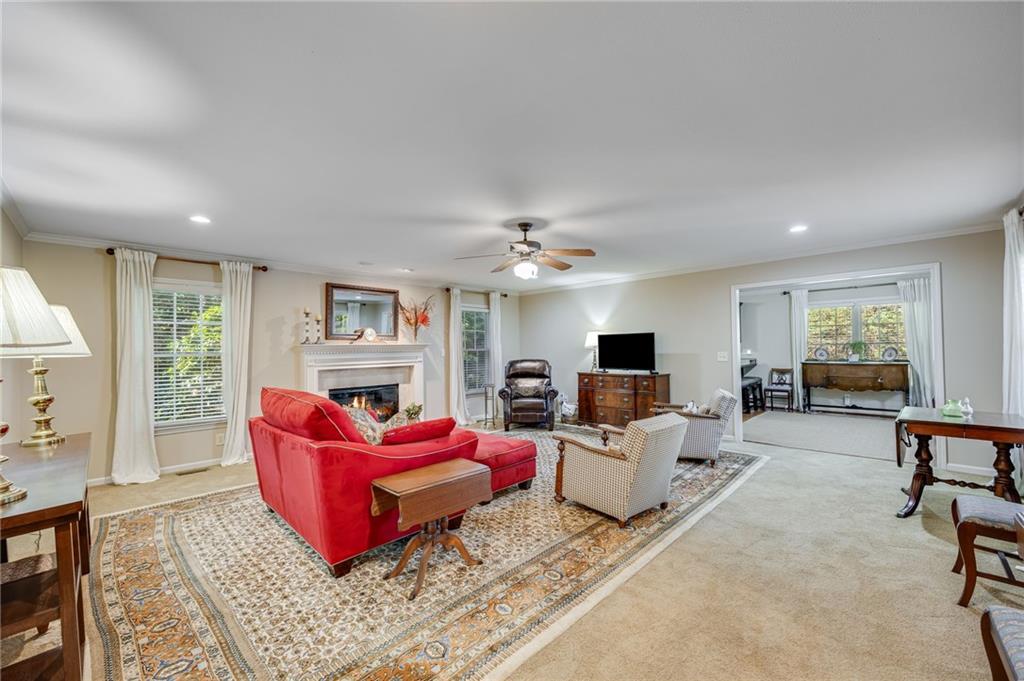 153 Dunlap Landing Road Gainesville, GA 30506 - Photo 56 of 67 a living room with furniture or window and a flat screen tv