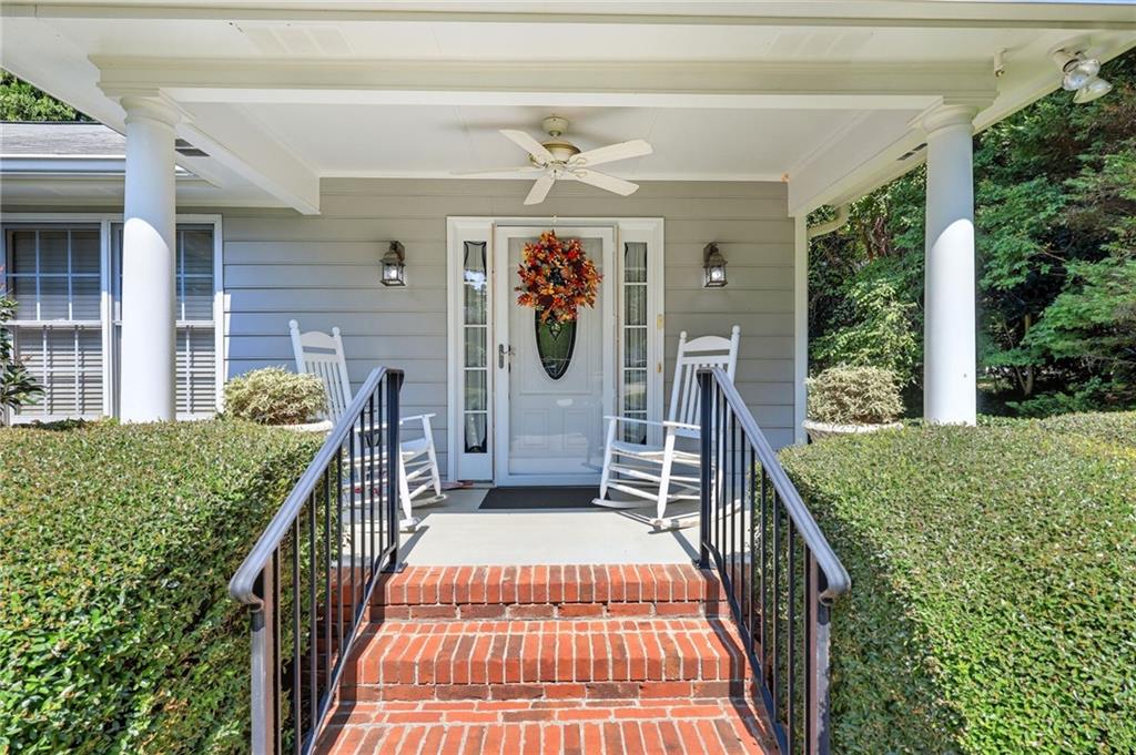 153 Dunlap Landing Road Gainesville, GA 30506 - Photo 7 of 67 a balcony view with a outdoor seating space