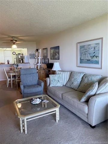 a view of a balcony with chairs