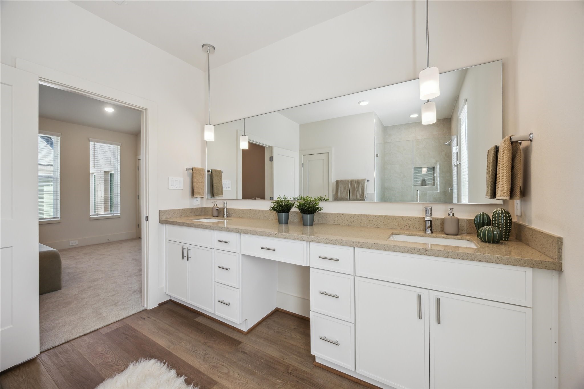 5903 Urban Pines Street Houston, TX 77091 - Photo 13 of 42 a spacious bathroom with a granite countertop sink a mirror and a