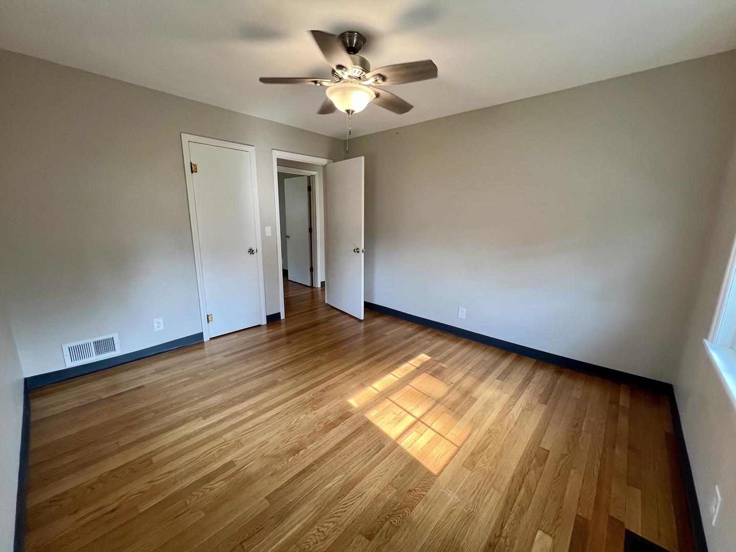 1528 Division Street Charleston, IL 61920 - Photo 22 of 45 wooden floor in an empty room