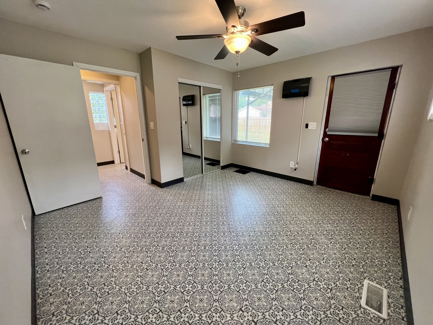 1528 Division Street Charleston, IL 61920 - Photo 32 of 45 wooden floor in an empty room with a window