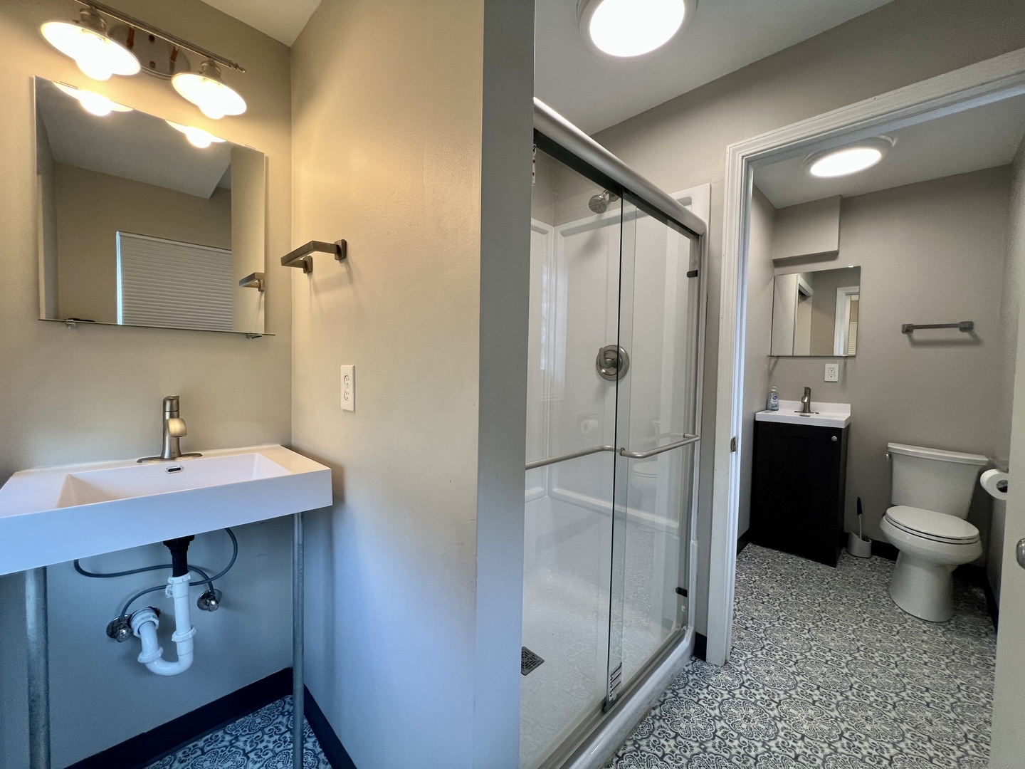 1528 Division Street Charleston, IL 61920 - Photo 37 of 45 a bathroom with a sink toilet and shower