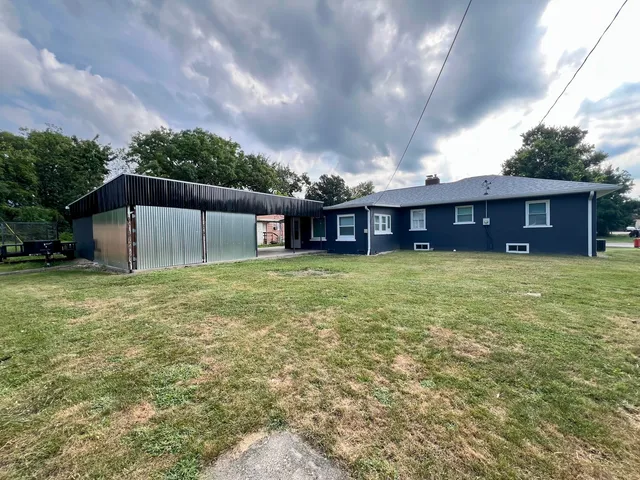 a backyard of a house with lots of green space