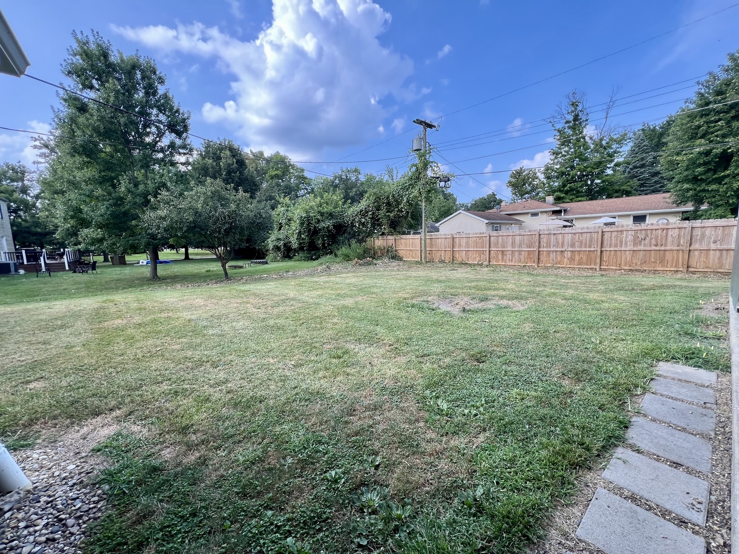 1528 Division Street Charleston, IL 61920 - Photo 45 of 45 a backyard of a house with lots of green space