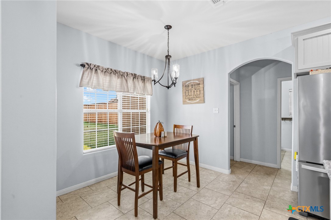711 Mason Circle Victoria, TX 77904 - Photo 12 of 29 a view of a dining room with furniture window and outside view