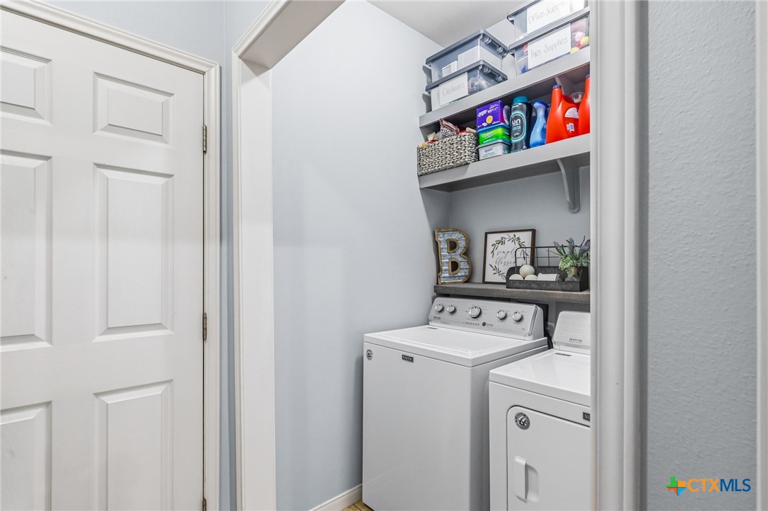 711 Mason Circle Victoria, TX 77904 - Photo 21 of 29 a utility room with dryer and washer
