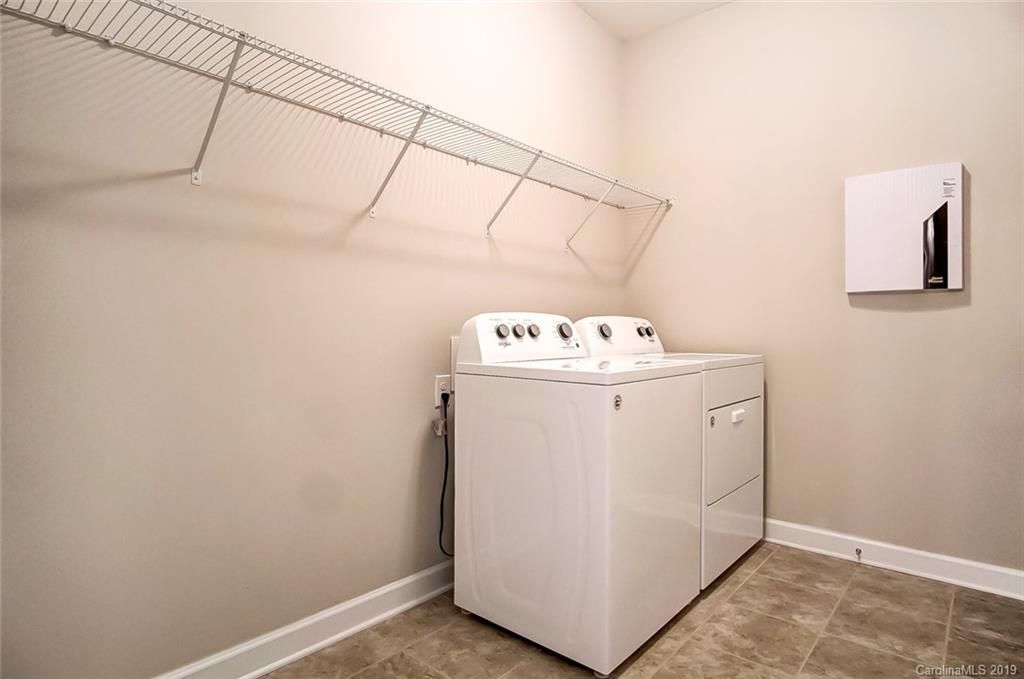 1280 Independence Street, Unit 58 Tega Cay, SC 29708 - Photo 26 of 31 a utility room with dryer and washer