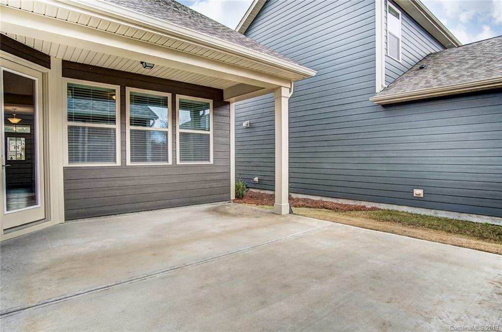 1280 Independence Street, Unit 58 Tega Cay, SC 29708 - Photo 28 of 31 a view of a house with a outdoor space