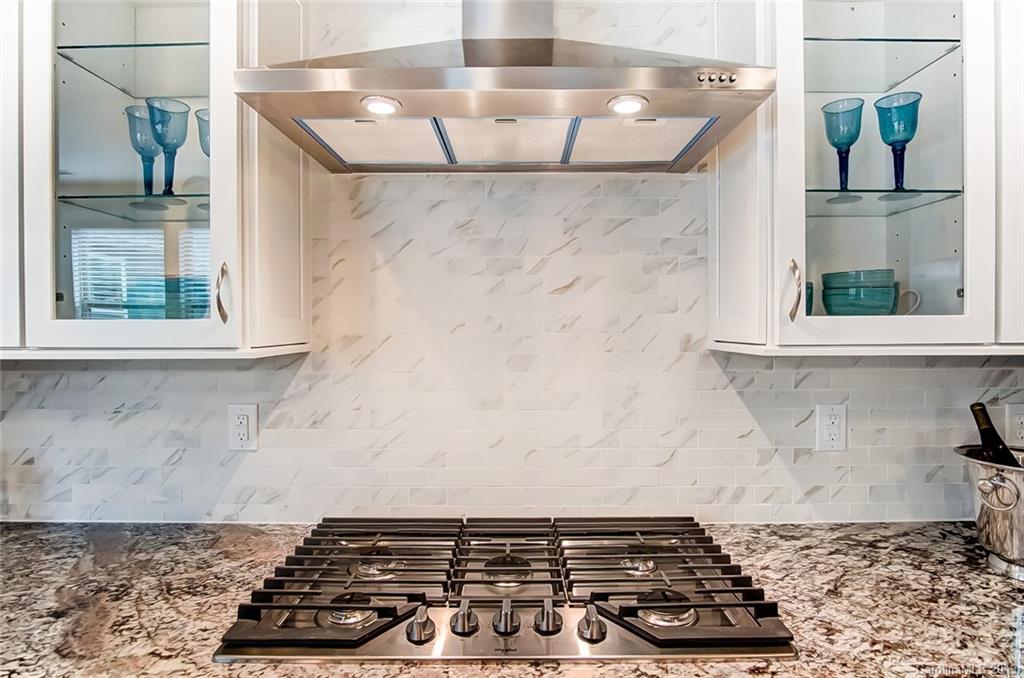 1280 Independence Street, Unit 58 Tega Cay, SC 29708 - Photo 10 of 31 a close view of a stove in a kitchen